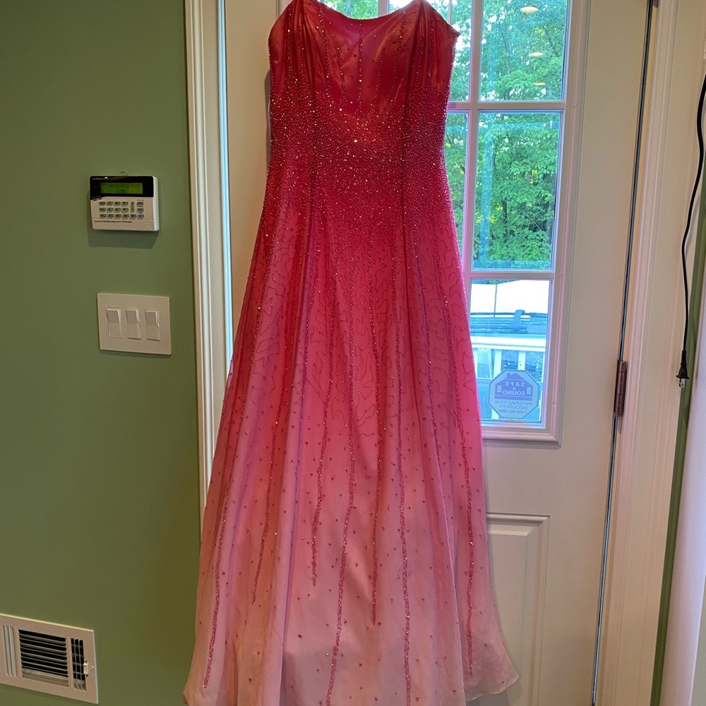 Lara pink prom dress worn once. Few minor pulls.